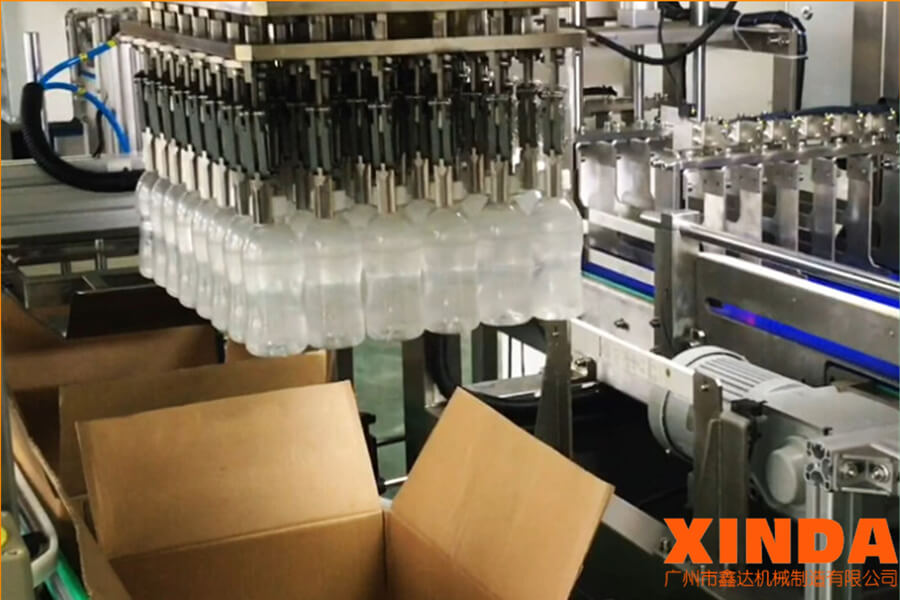 抓取式裝箱機_夾取式裝箱機_抓手式裝箱機,廠家直銷—廣州鑫達(dá)機械